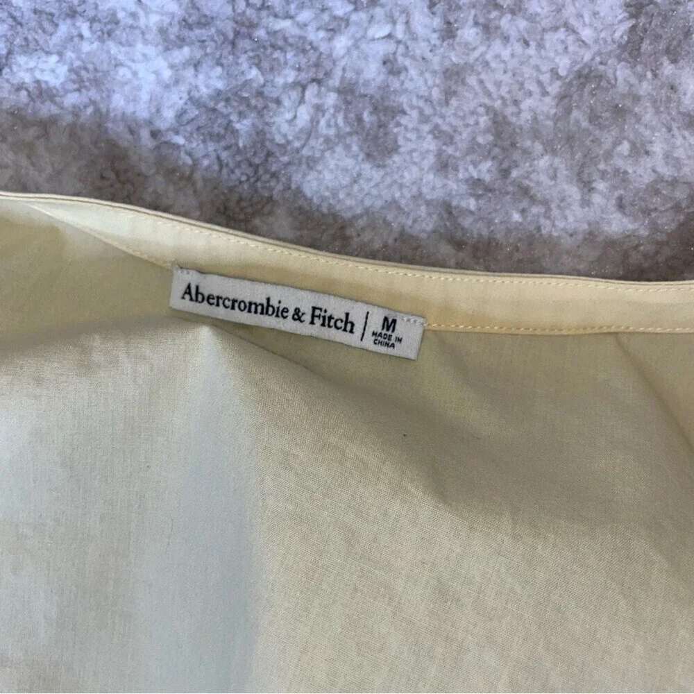 Abercrombie & Fitch pale yellow cropped front tie long sleeve ruffled V-neck SM